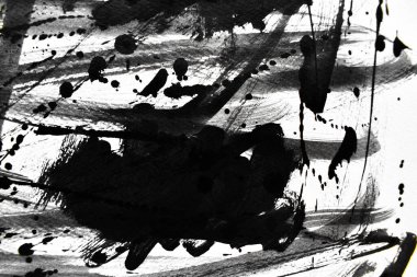 Arka plan siyaha boyanır. Mürekkep ve suluboya sanatından yaratıcı soyut sanat.