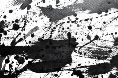 Arka plan siyaha boyanır. Mürekkep ve suluboya sanatından yaratıcı soyut sanat.