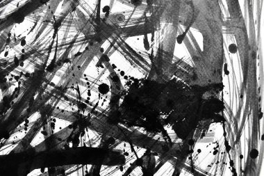 Arka plan siyaha boyanır. Mürekkep ve suluboya sanatından yaratıcı soyut sanat.