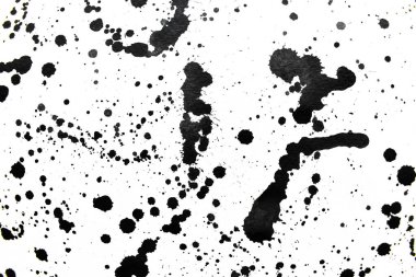 Arka plan siyaha boyanır. Mürekkep ve suluboya sanatından yaratıcı soyut sanat.