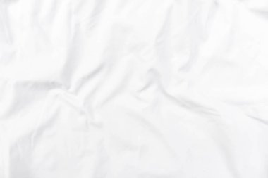 Soyut beyaz kumaş dokusu arkaplanı. Dalgalı beyaz kumaş.