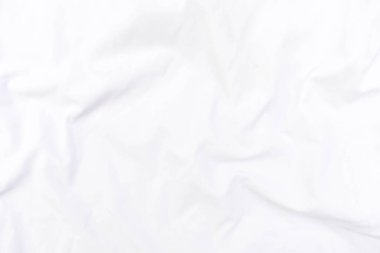 Soyut beyaz kumaş dokusu arkaplanı. Dalgalı beyaz kumaş.