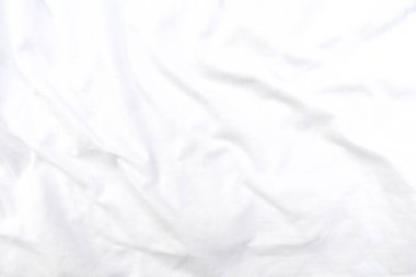 Soyut beyaz kumaş dokusu arkaplanı. Dalgalı beyaz kumaş.