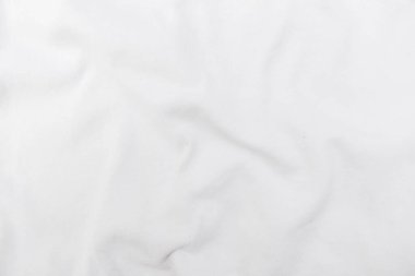 Soyut beyaz kumaş dokusu arkaplanı. Dalgalı beyaz kumaş.