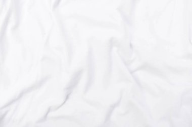 Soyut beyaz kumaş dokusu arkaplanı. Dalgalı beyaz kumaş.