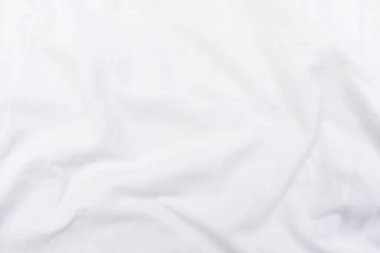 Soyut beyaz kumaş dokusu arkaplanı. Dalgalı beyaz kumaş.