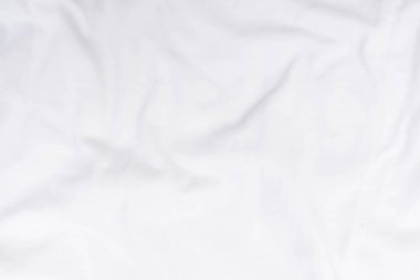 Soyut beyaz kumaş dokusu arkaplanı. Dalgalı beyaz kumaş.