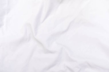 Soyut beyaz kumaş dokusu arkaplanı. Dalgalı beyaz kumaş.