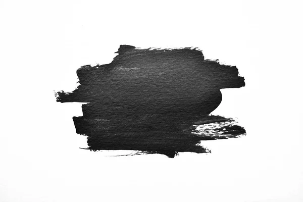 Arka plan siyaha boyanır. Mürekkep ve suluboya sanatından yaratıcı soyut sanat.