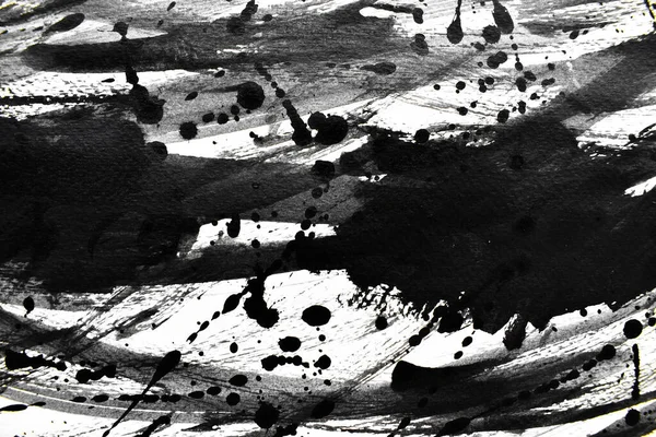 Arka plan siyaha boyanır. Mürekkep ve suluboya sanatından yaratıcı soyut sanat.