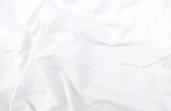 Soyut beyaz kumaş dokusu arkaplanı. Dalgalı beyaz kumaş.