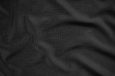 Arkaplan dokusu siyah kumaş. Soyut koyu dalgalı yumuşak. Kumaş kırışmış. Lüks moda tarzı..