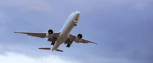 Commercial passenger jet aircraft landing at the airport.