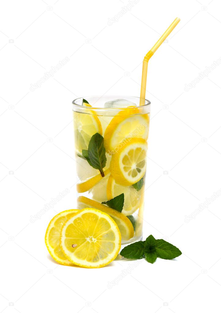 Drink with lemon, ice cubes and mint leaves on a white background