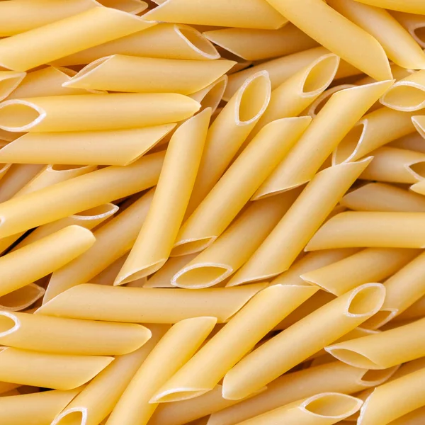 Penne Lisce Macaroni Italian Pasta Background — Stock Photo, Image