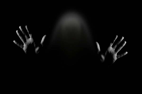 Horror background. Scary ghost isolated on black background.