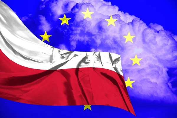 Polish Flag waving against European Union Flag and cloudy sky background.