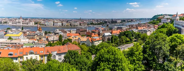 A panorama view across the River Danube in Budapest from the Fisherman\'s Bastion in the summertime