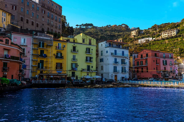 A view looking towards the shore of the marina Piccola, Sorrento, Italy in the early morning sunshine