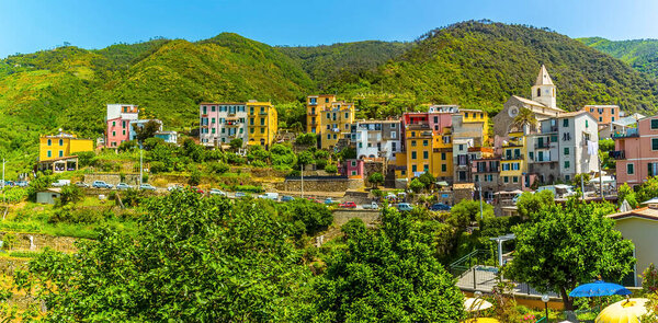 A panorama view across the Cinque Terre village of Corniglia, Italy in the summertime