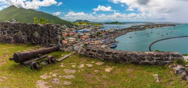 A panorama view from Fort Louis above the settlement of Marigot in St Martin clipart