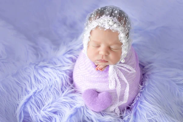 Newborn Girl Sweetly Sleeping Cocoon Lilac Background Fur Beautiful Cap — Stock Photo, Image