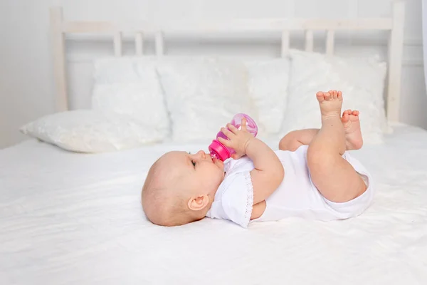 Month Old Baby Lies White Bed Drinks Milk Bottle Baby — Stock Photo, Image