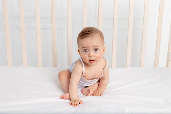 Smiling Baby Girl Months Old Sitting Crib Children Room White — стоковое фото