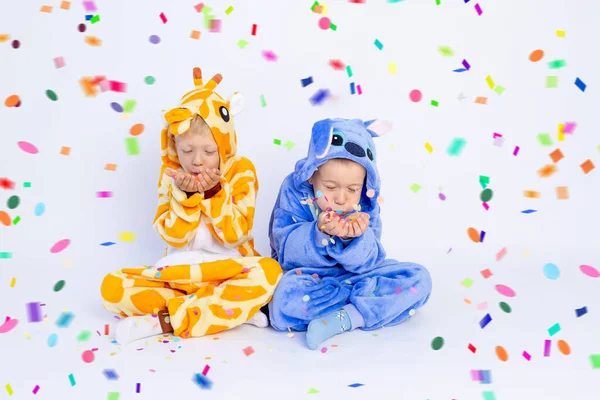 Little Boys Brothers Fun Bright Costumes Sit White Isolated Background — Stock Photo, Image