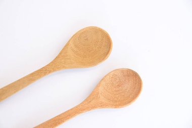 Kaşık ahşap kadar arka plan ile kapatın. Pişirme kavramı.