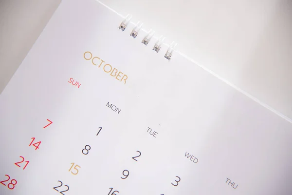 Blurred calendar page in planning concept.