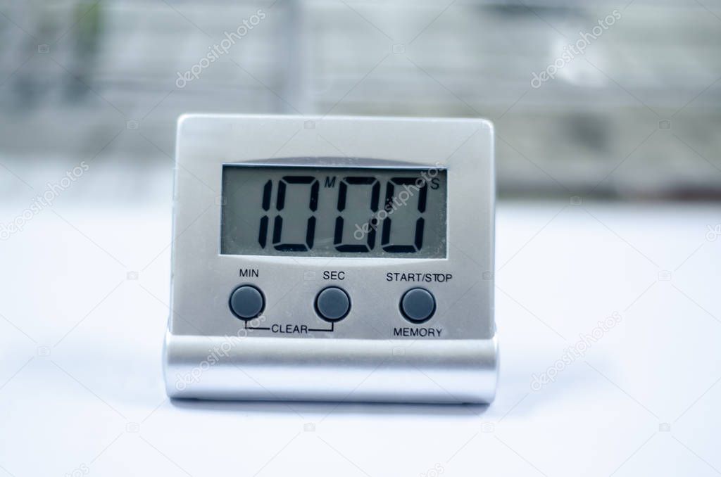 White timer clock in laboratory.