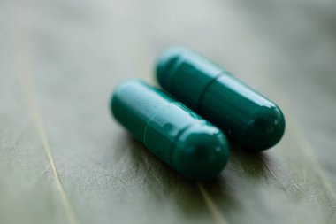 Bitki kavramı yeşil haplar.