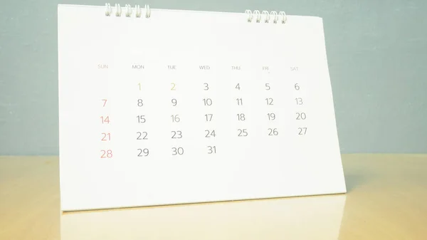 Calendar page on pastel tone.