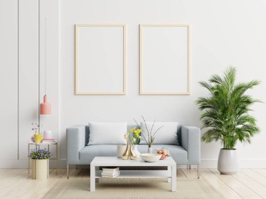 Oturma odasının içinde dikey çerçeveli poster modellemesi. 3D işlemeli.