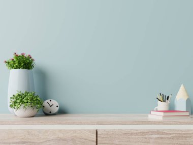 Yaratıcı masası olan modern işyerlerinde mavi duvarlar ve 3D görüntüler var.