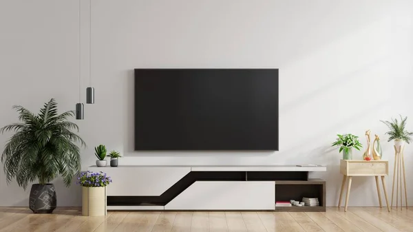 LED TV on the white wall in living room,minimal design,3d rendering