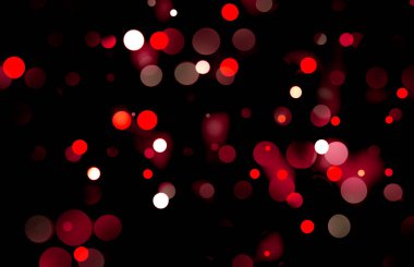 Arka plan olarak kullanılmak üzere kırmızı ve beyaz tonlarında ince bir aydınlatma şenlik bokeh tasarımı.