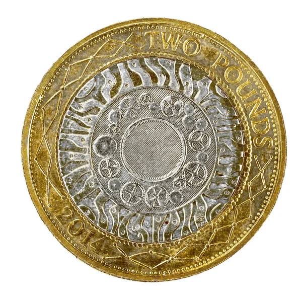 2014 파운드 동전으로 비즈니스 경제를 나타내는 기어를 묘사하는 배경에서 — 스톡 사진