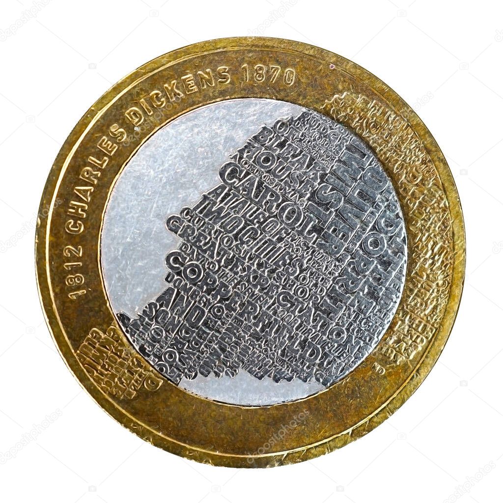 A UK two pound coin depicting Charles Dickens isolated on a white background