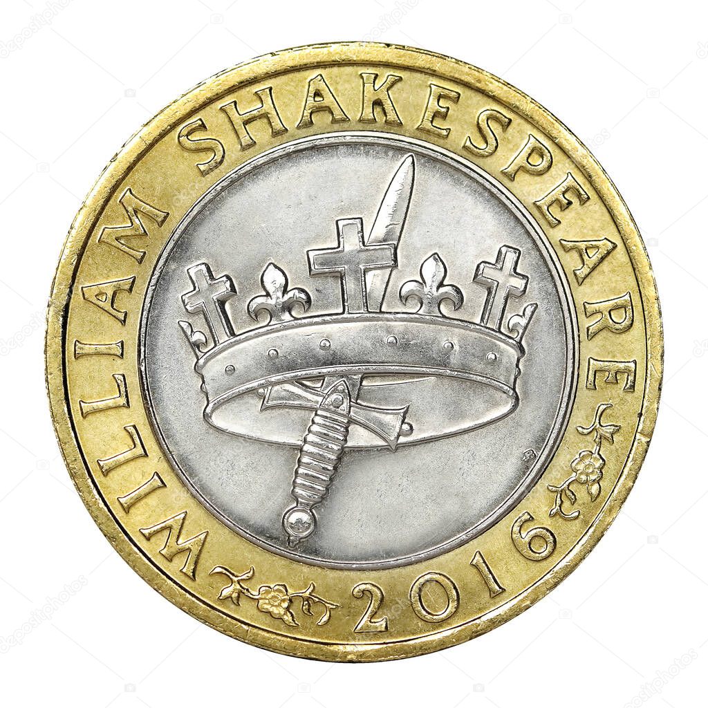 A William Shakespeare histories commemorative two pound coin with hollow crown and dagger design isolated on a white background 