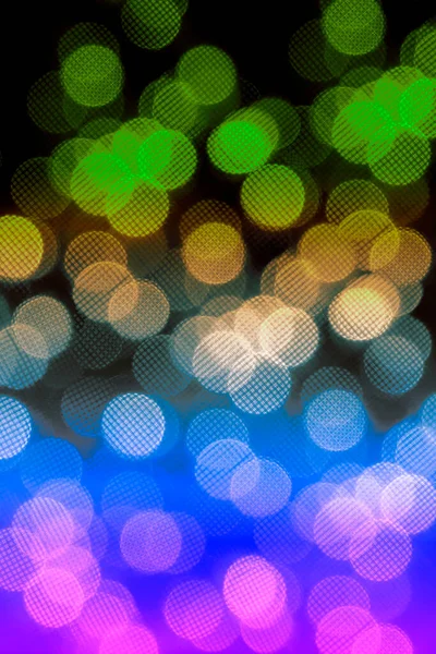 Resumo Luzes Bokeh Multicoloridas Contra Fundo Escuro — Fotografia de Stock
