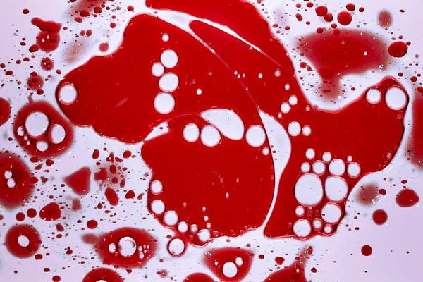 Macro Photo Oil White Milk Bubbles Red Background — Stock Photo, Image