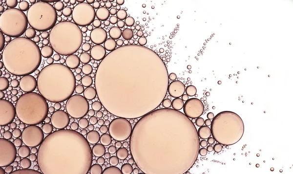 Bir baloncuk soyut aşırı yakın çekim makrosu beyaz üzerinde izole şeftali