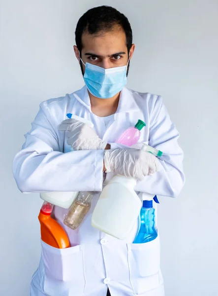 Arabic muslim, doctor holding many hygiene products