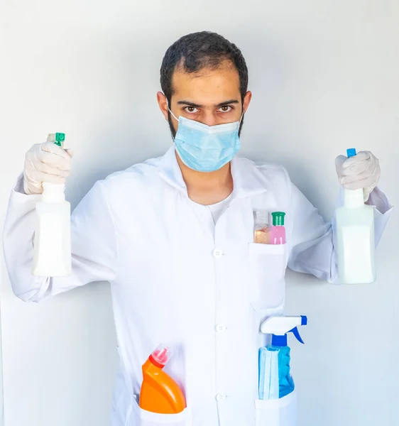 Arabic muslim, doctor holding many hygiene products