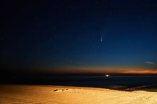 Comet Neowise. Stars and Sun Dawn at Baltic Sea
