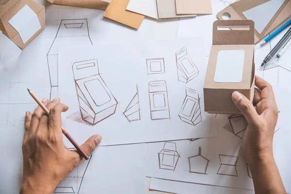 Tasarımcı çizim tasarımı Brown el işi karton kağıt ürün eko paketleme kutu geliştirme şablonu markalaşma etiketi. Tasarımcı stüdyo .