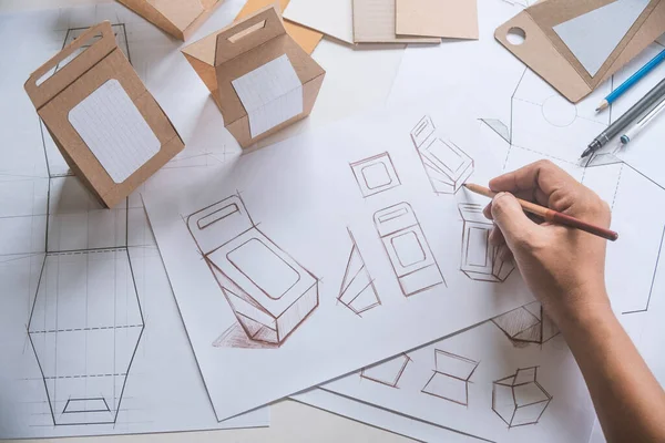 Tasarımcı çizim tasarımı Brown el işi karton kağıt ürün eko paketleme kutu geliştirme şablonu markalaşma etiketi. Tasarımcı stüdyo .