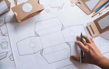 Tasarımcı çizim tasarımı Brown el işi karton kağıt ürün eko paketleme kutu geliştirme şablonu markalaşma etiketi. Tasarımcı stüdyo .